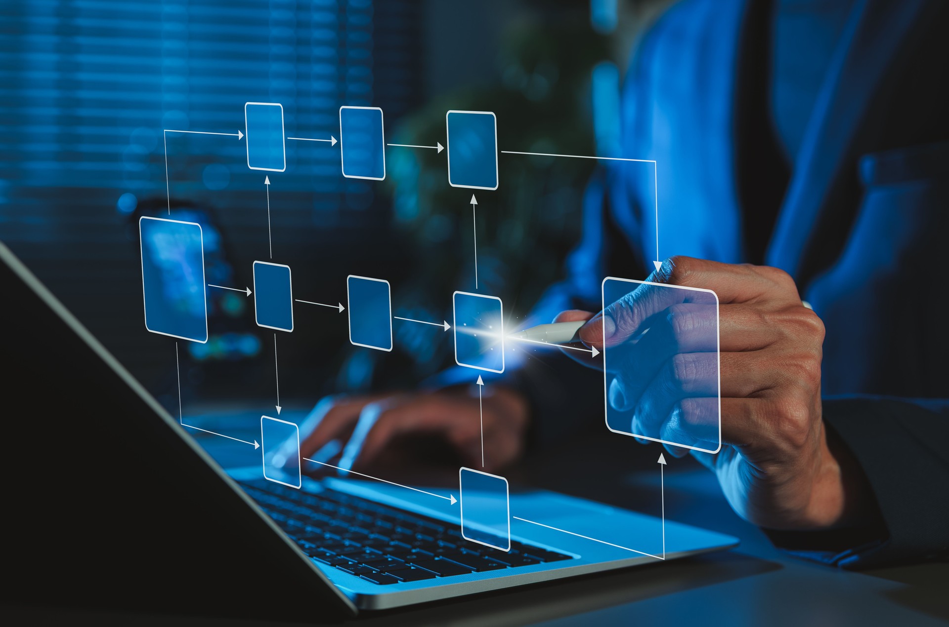 Workflow automation and business process mapping concept. Businessman using laptop with flowchart interface, representing workflow automated, process planning, business flow, system optimization,